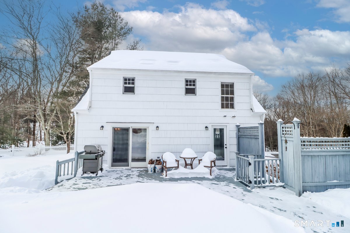 16 A Pole Bridge Road Newtown, CT 06482 - Photo 22 of 27 a view of a house with snow on the side of the road