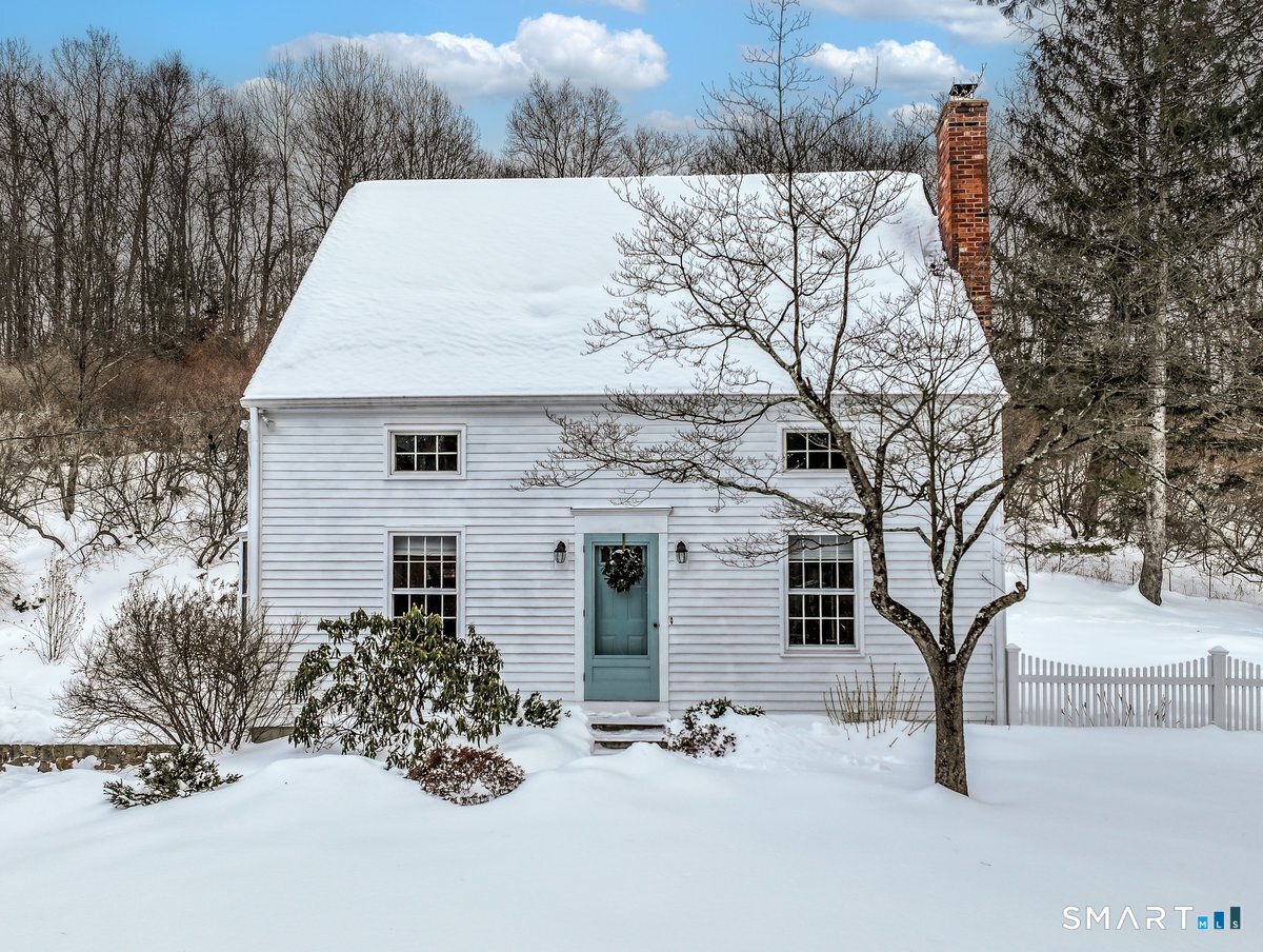 16 A Pole Bridge Road Newtown, CT 06482 - Photo 23 of 27 a view of a house with large trees and sitting area