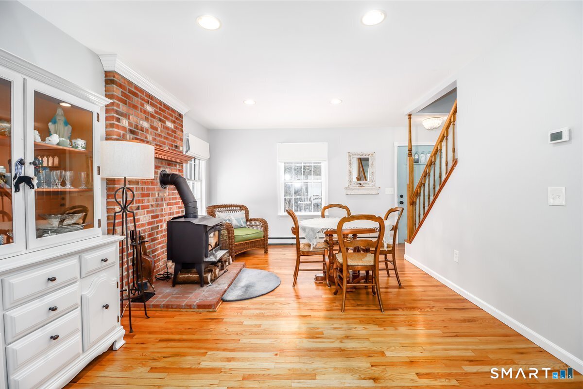 16 A Pole Bridge Road Newtown, CT 06482 - Photo 8 of 27 a view of a livingroom with lounge chair