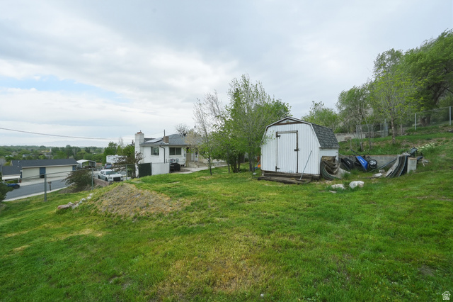 500 North 800 East Springville, UT 84663 - Photo 43 of 51 View of green lawn featuring a shed
