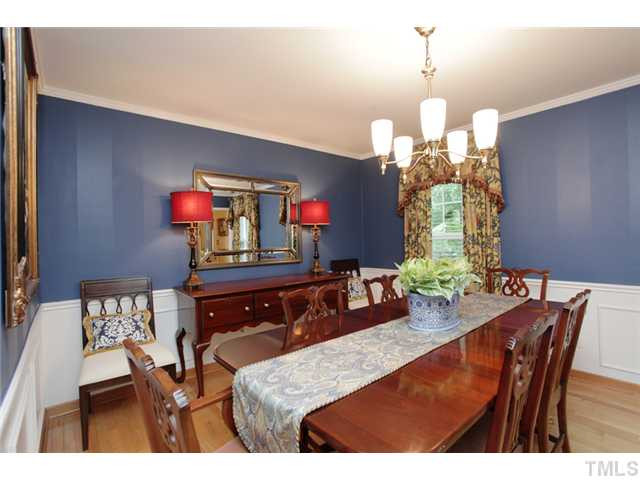 220 Bayleaf Drive Raleigh, NC 27615 - Photo 2 of 25 The family room is well appointed with hardwood floors, smooth ceilings, a new light fixture and wainscott paneling. Dining Room