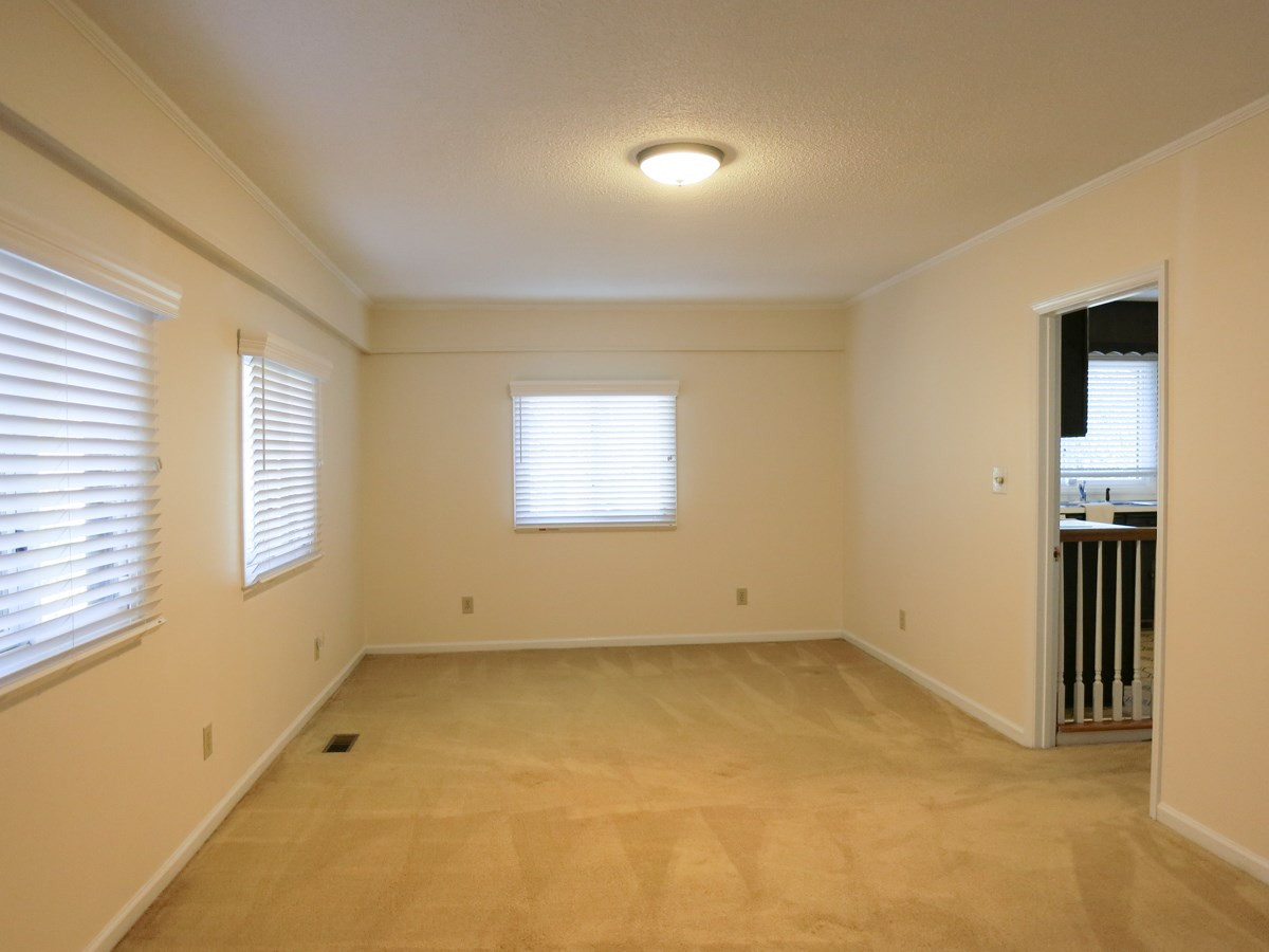 5809 Old Forge Circle Raleigh, NC 27609 - Photo 10 of 25 The adjacent Bonus/Play Rm w/neutral carpet, NEW light fixture, lg WIC & door to the upper Patio. Bonus Room