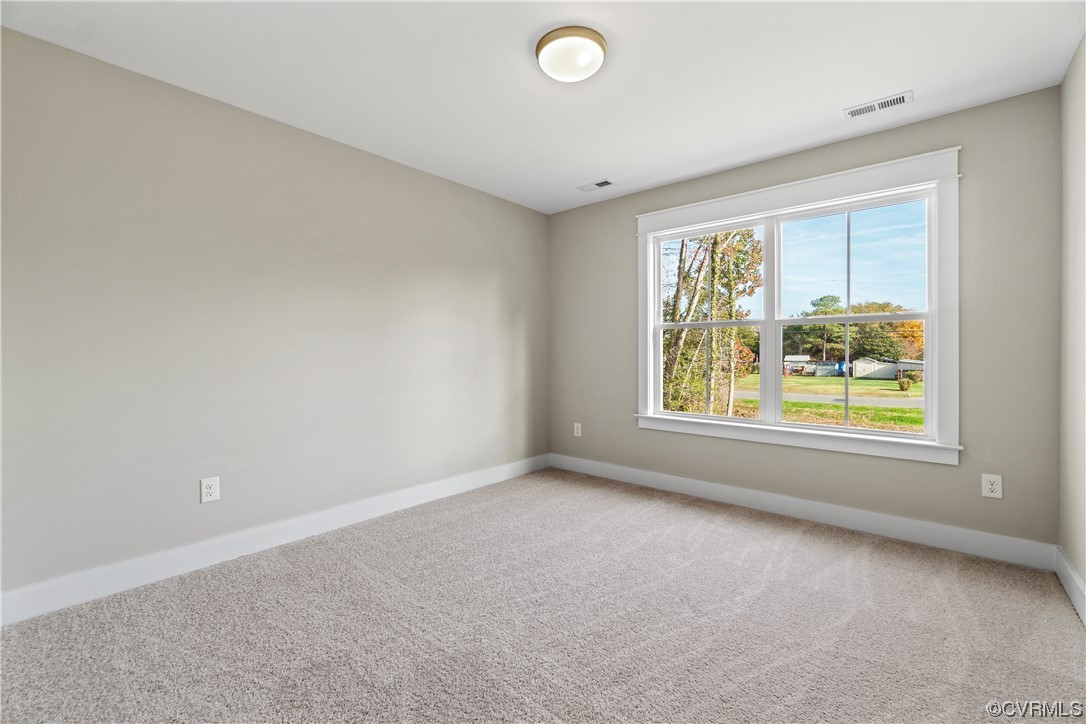10010 Bo Trail Mechanicsville, VA 23116 - Photo 14 of 16 an empty room with windows and closet