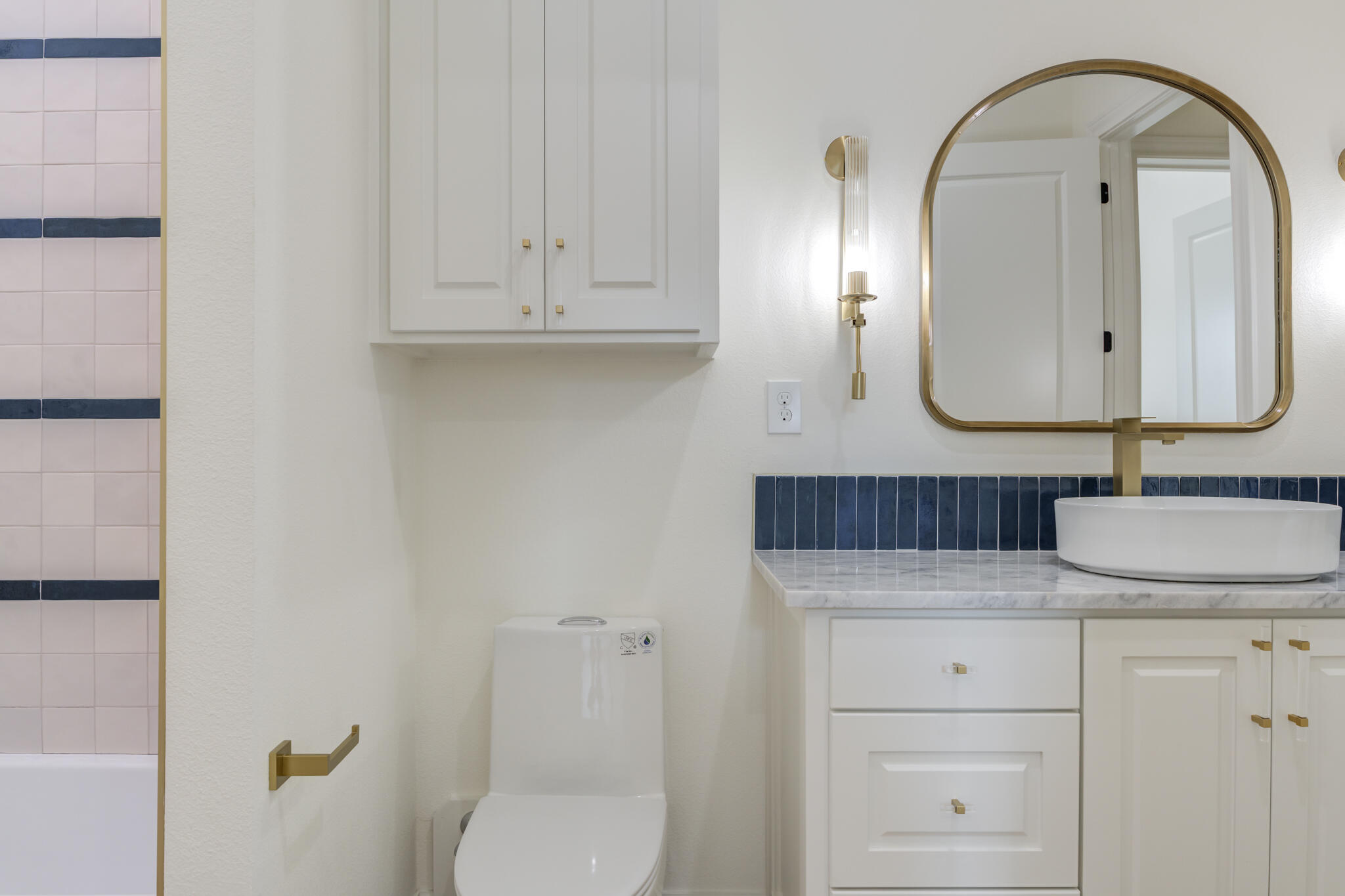 3612 143rd Street Lubbock, TX 79423 - Photo 63 of 91 a bathroom with a sink and mirror