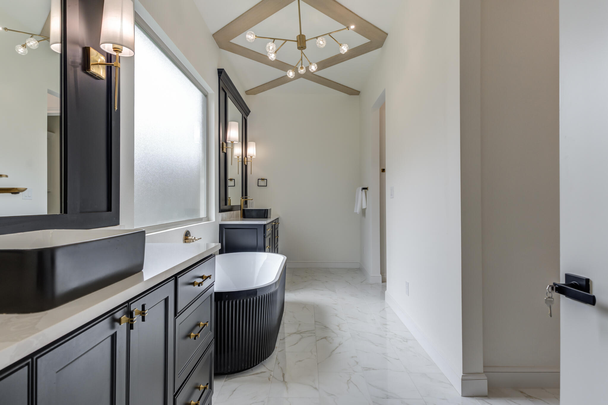 3612 143rd Street Lubbock, TX 79423 - Photo 73 of 91 a bathroom with a double vanity sink and a mirror