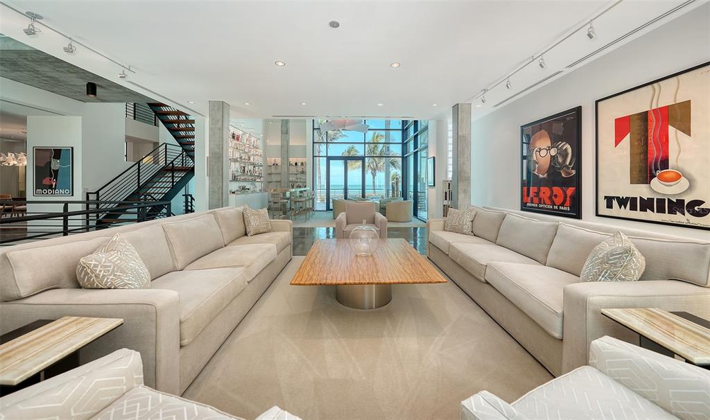 8250 Sanderling Road Sarasota, FL 34242 - Photo 15 of 61 a living room with furniture and a large window