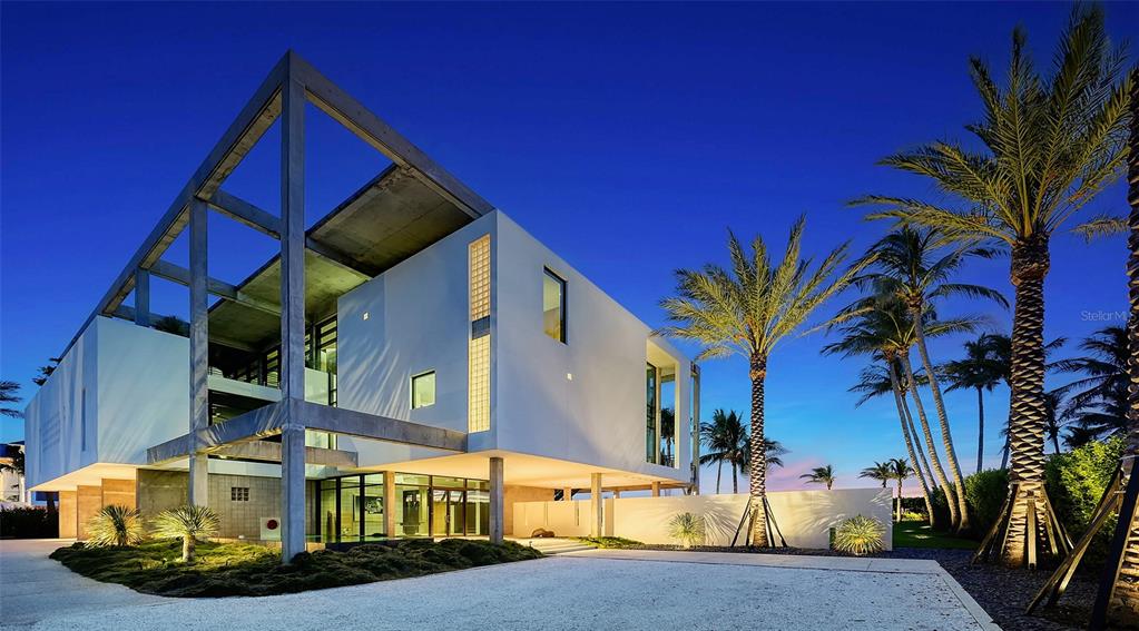 8250 Sanderling Road Sarasota, FL 34242 - Photo 2 of 61 a view of a building with a street