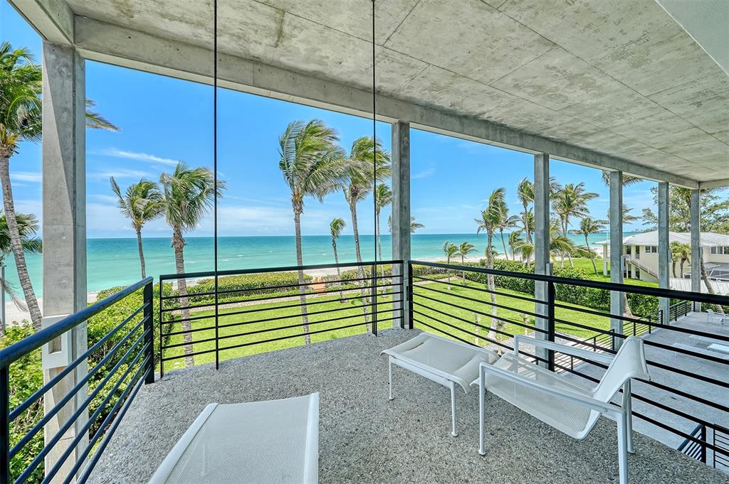 8250 Sanderling Road Sarasota, FL 34242 - Photo 30 of 61 a view of a bench in the balcony