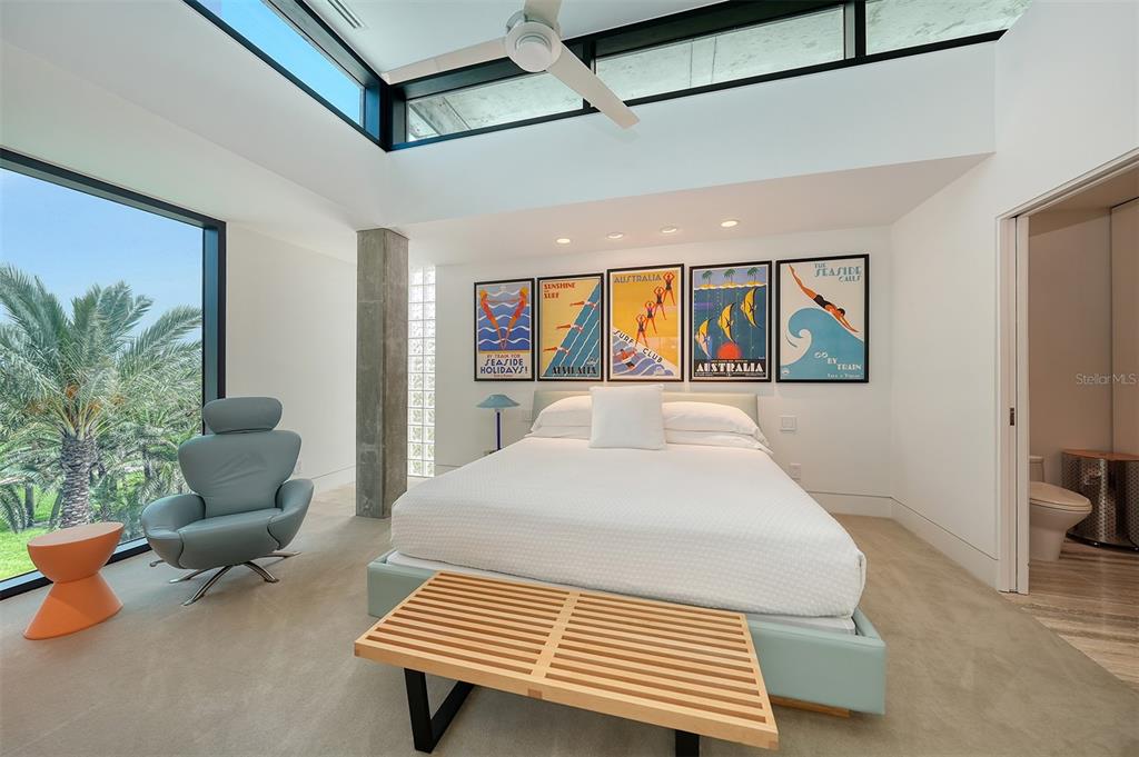 8250 Sanderling Road Sarasota, FL 34242 - Photo 42 of 61 a living room with furniture and a window