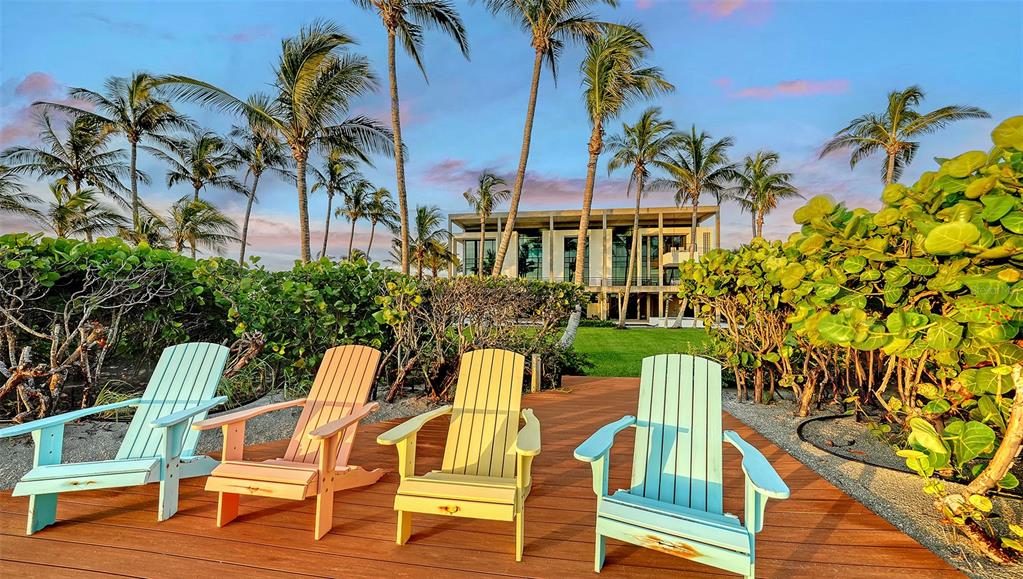 8250 Sanderling Road Sarasota, FL 34242 - Photo 48 of 61 a view of an chairs and table in the patio