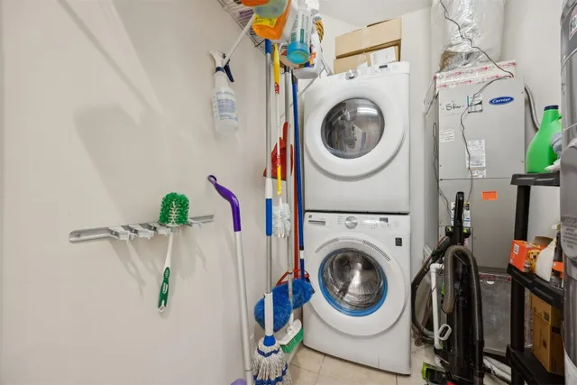 a front view of a building with a garden