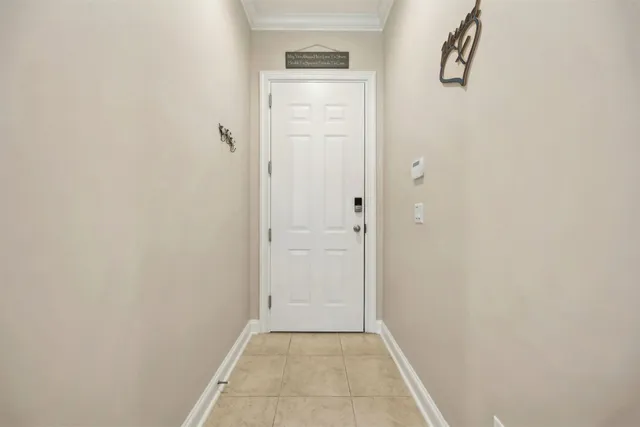 a kitchen with a sink and refrigerator