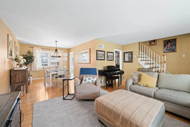 a living room with furniture and a table