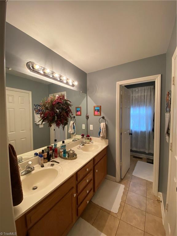 8006 Daltonshire Drive Oak Ridge, NC 27310 - Photo 14 of 29 Primary Bath