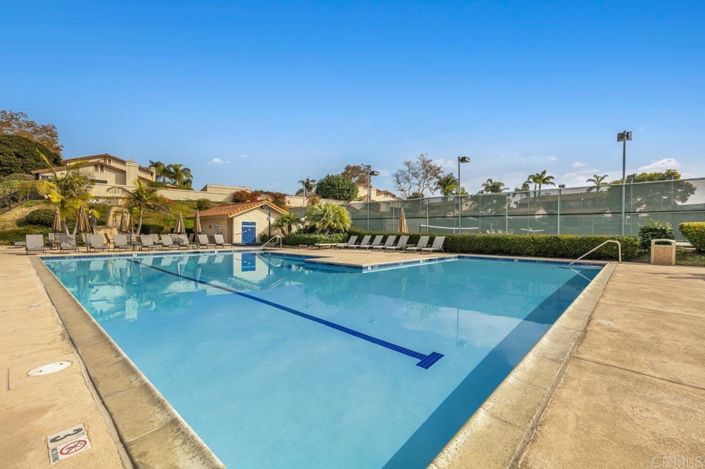 6972 Batiquitos Drive Carlsbad, CA 92011 - Photo 21 of 36 a view of a swimming pool with a terrace