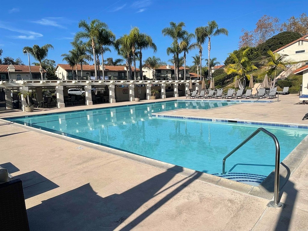 6972 Batiquitos Drive Carlsbad, CA 92011 - Photo 33 of 36 a view of swimming pool with outdoor seating and city view