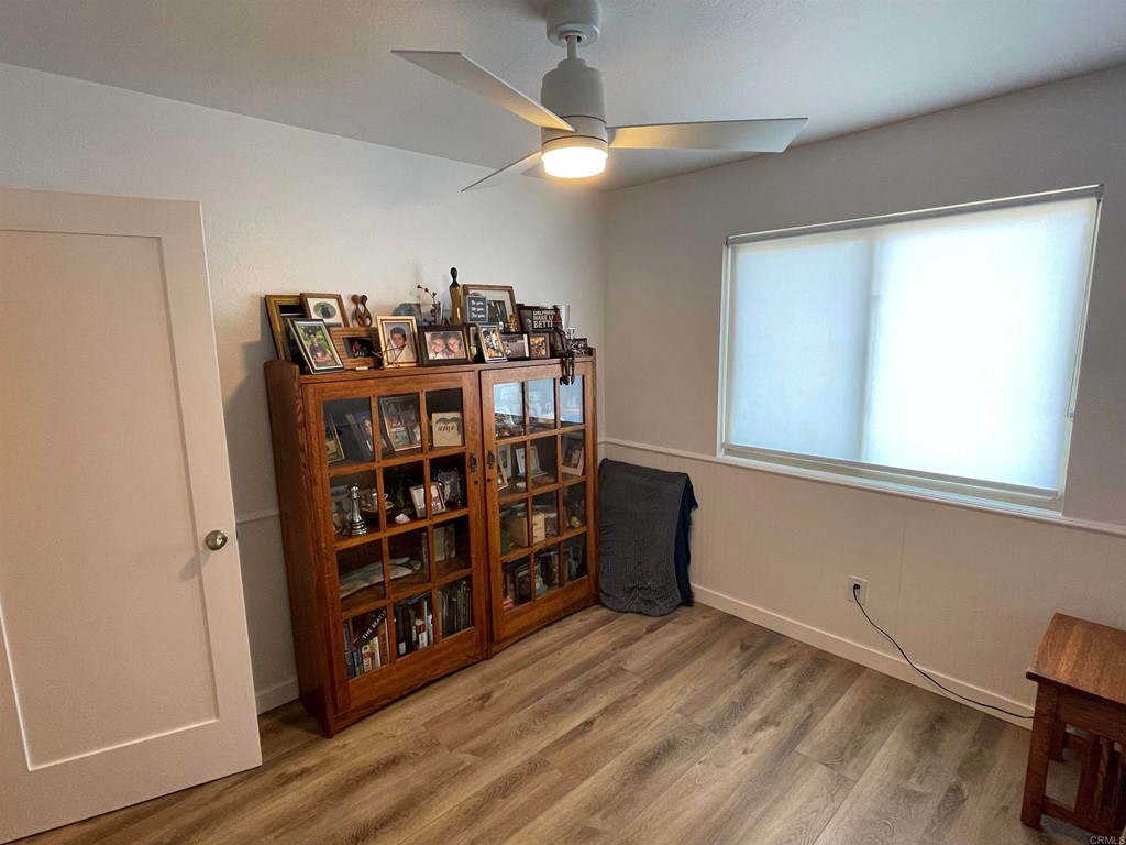 6972 Batiquitos Drive Carlsbad, CA 92011 - Photo 10 of 36 a view of a big room with cabinets and wooden floor