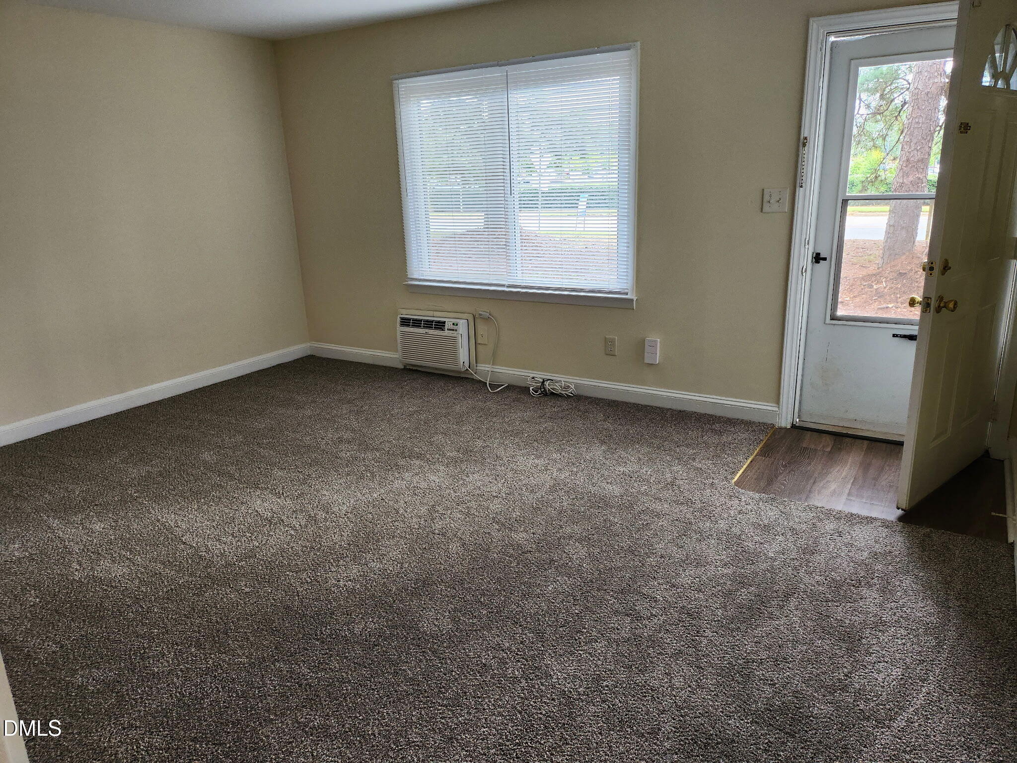 1302 Gorman Street Raleigh, NC 27606 - Photo 3 of 10 an empty room with a window