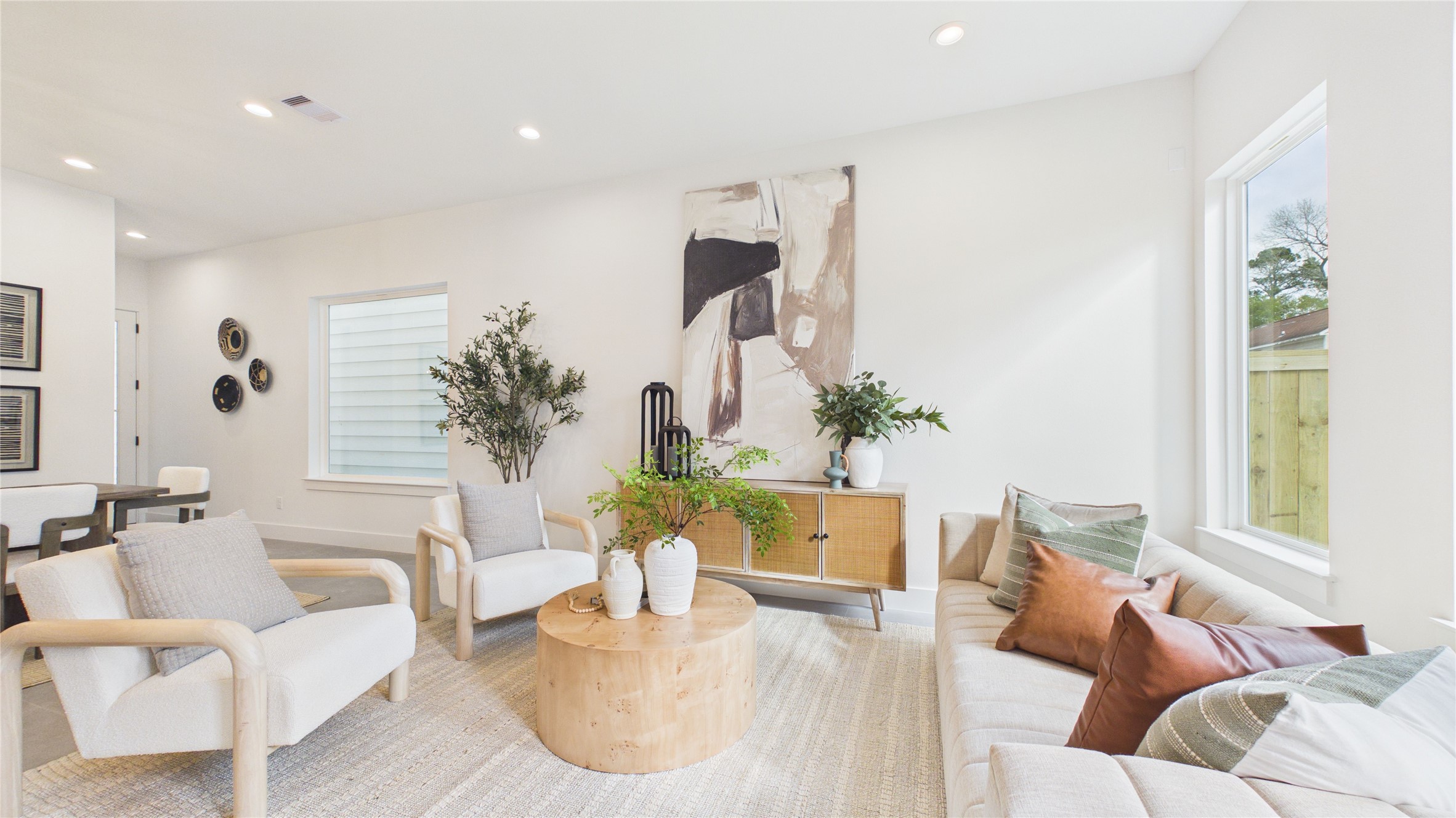 6058 Cebra Street Houston, TX 77091 - Photo 13 of 38 Enjoy lively debates, or intimate conversations with your favorite people in this airy living space!