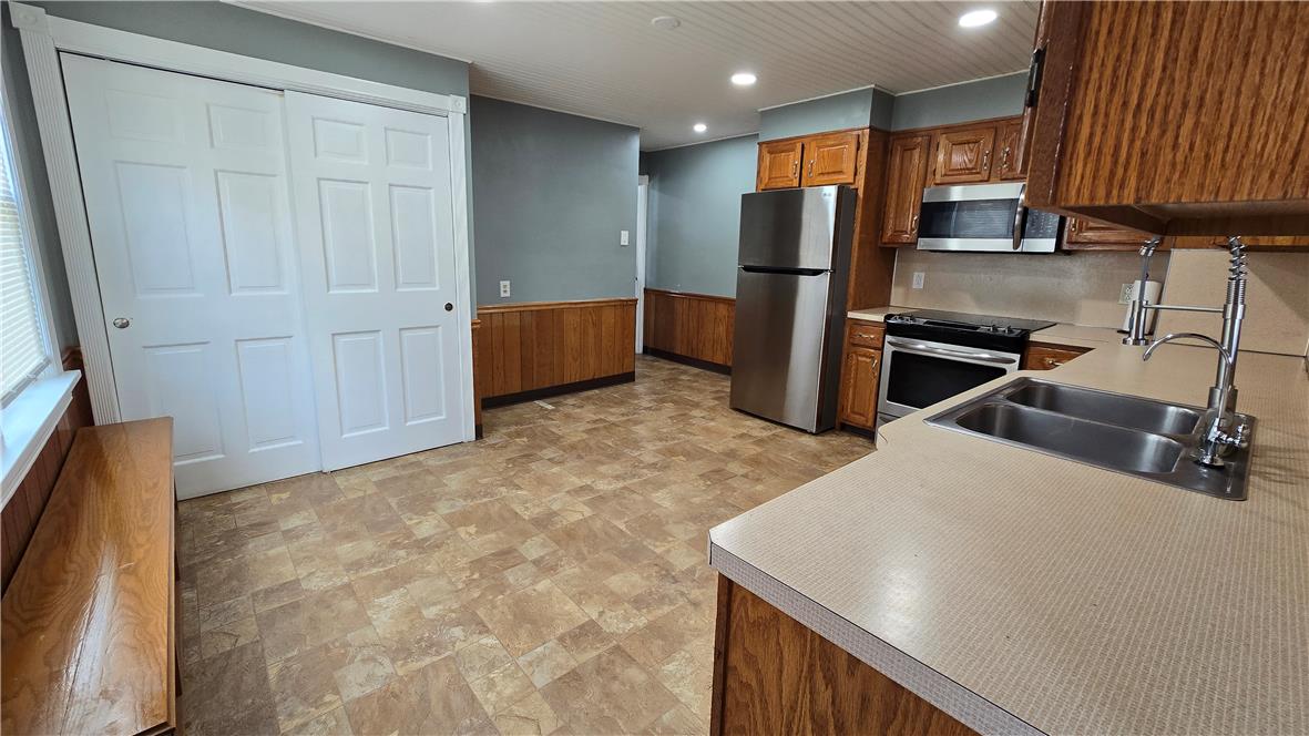 883 North Locust Street Hazleton, PA 18201 - Photo 20 of 83 Functional kitchen offers ample storage and modern stainless steel appliances.
