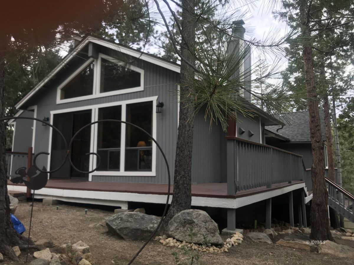 55441 Howland Road Idyllwild, CA 92549 - Photo 2 of 40 a front view of a house with windows