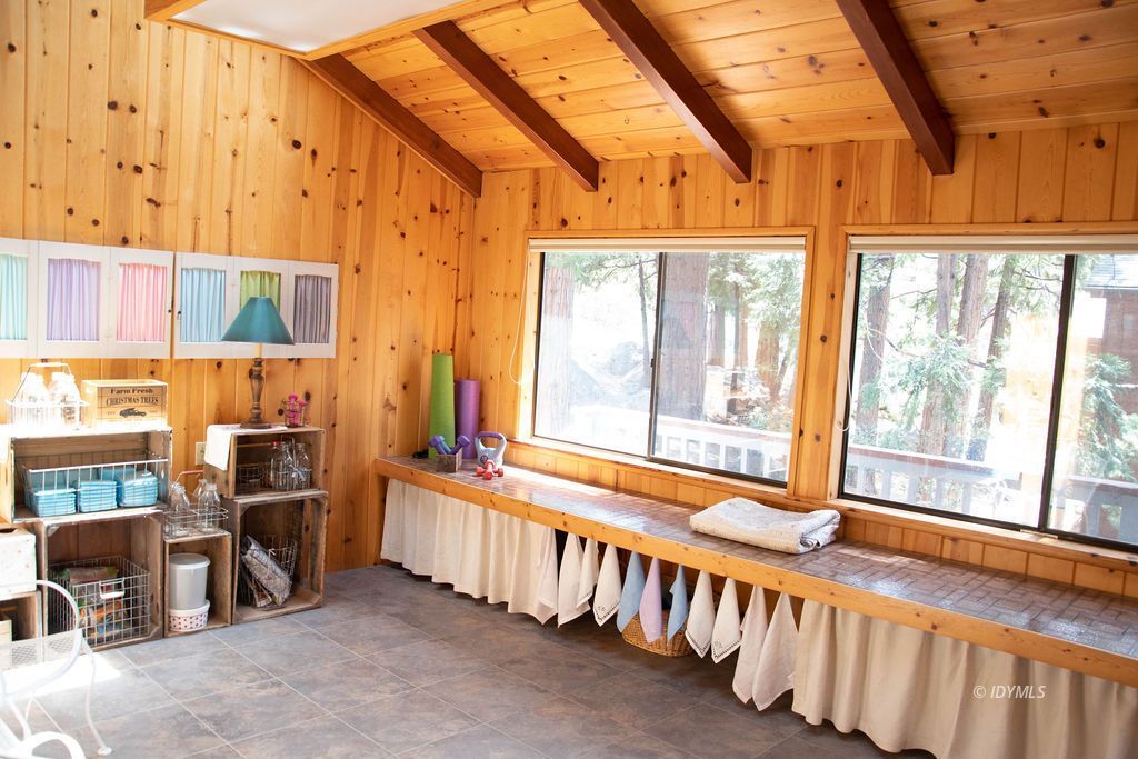 55441 Howland Road Idyllwild, CA 92549 - Photo 12 of 40 a view of a porch with wooden floor and furniture