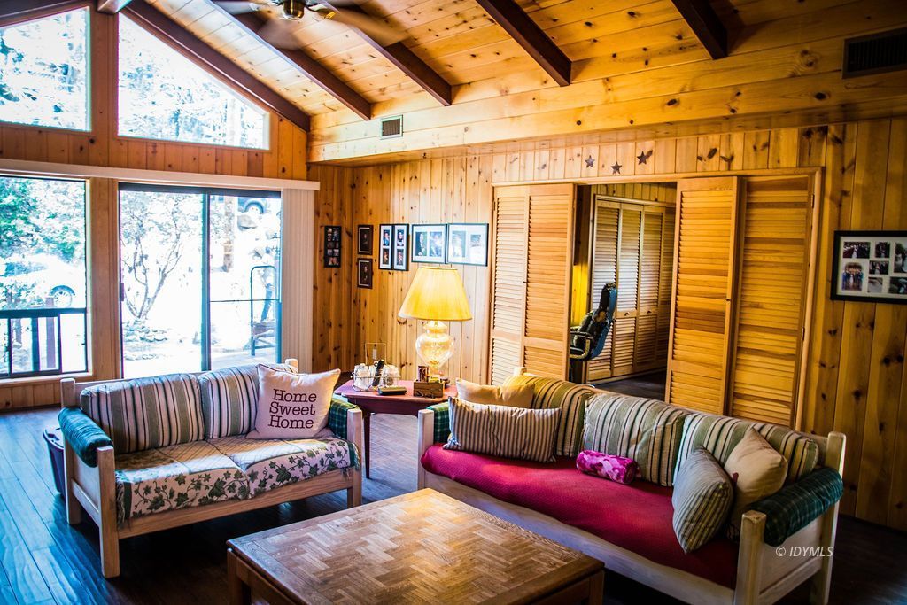 55441 Howland Road Idyllwild, CA 92549 - Photo 3 of 40 a living room with furniture and a large window