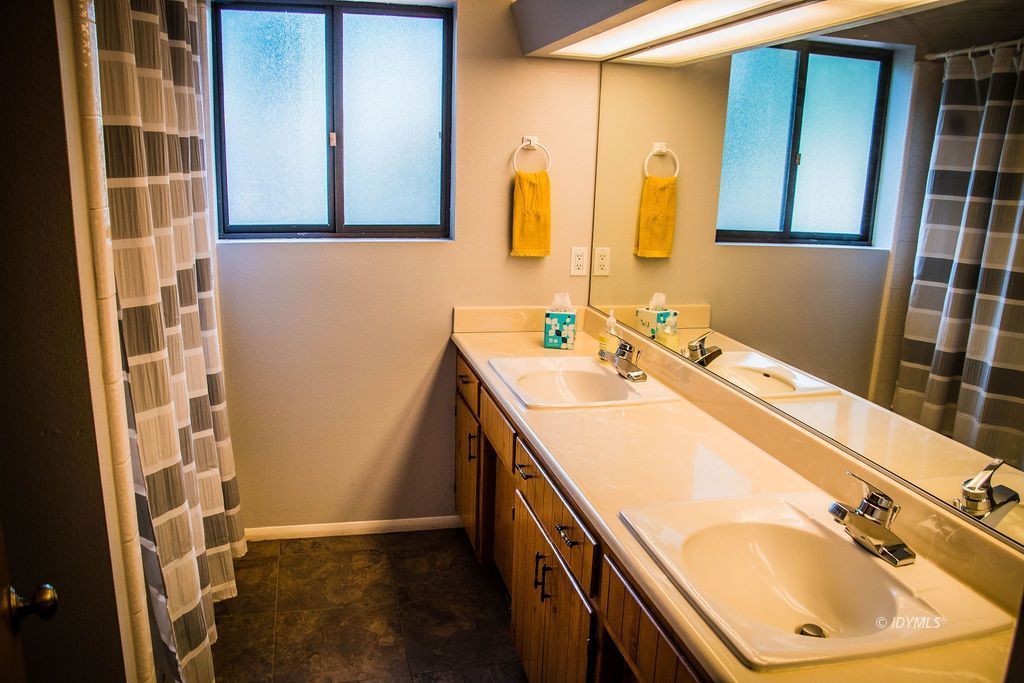 55441 Howland Road Idyllwild, CA 92549 - Photo 22 of 40 a bathroom with a sink and a mirror