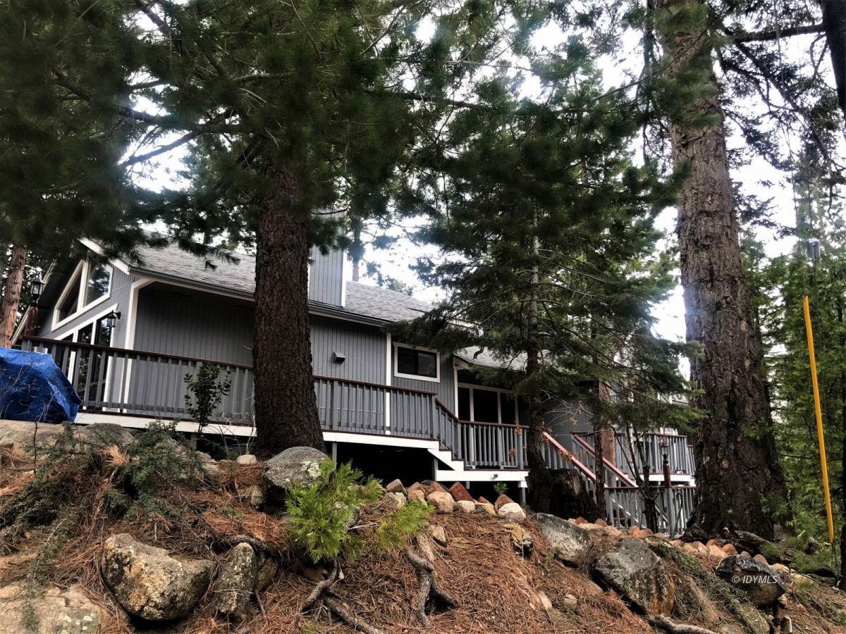 55441 Howland Road Idyllwild, CA 92549 - Photo 29 of 40 a front view of a house with a tree