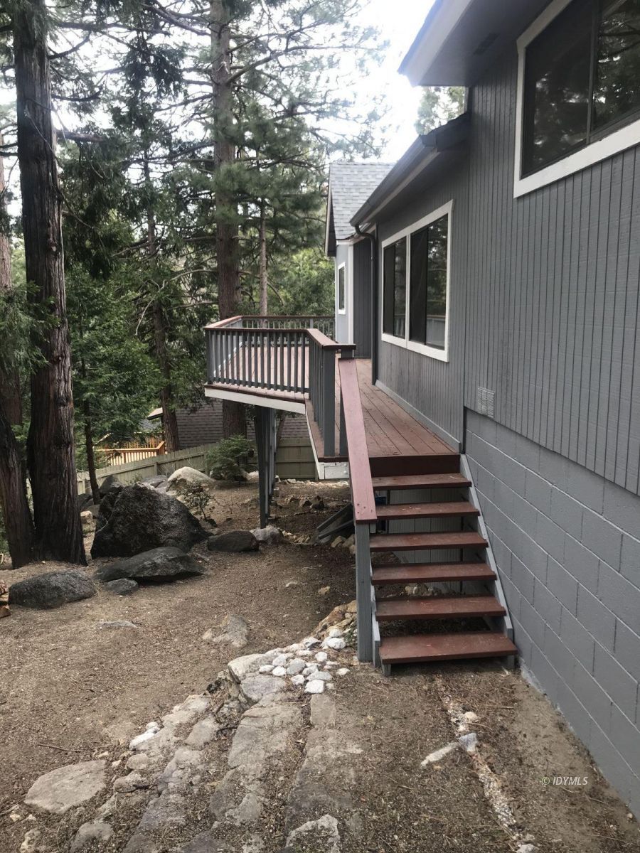 55441 Howland Road Idyllwild, CA 92549 - Photo 31 of 40 a view of a house with a yard