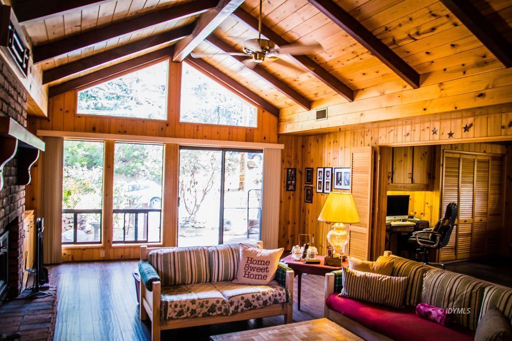 55441 Howland Road Idyllwild, CA 92549 - Photo 5 of 40 a living room with furniture and a large window