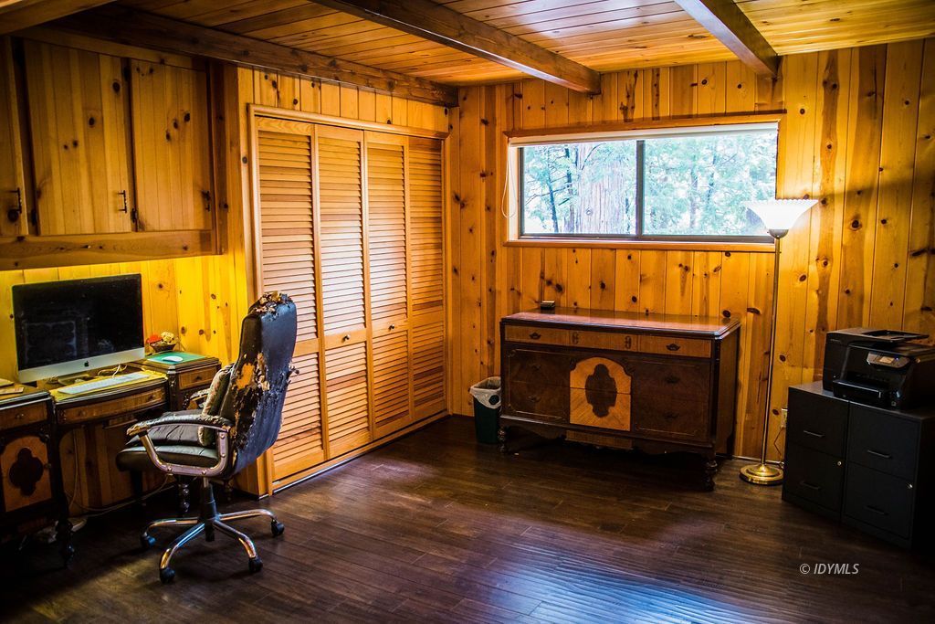55441 Howland Road Idyllwild, CA 92549 - Photo 8 of 40 a view of a livingroom with workspace and a window