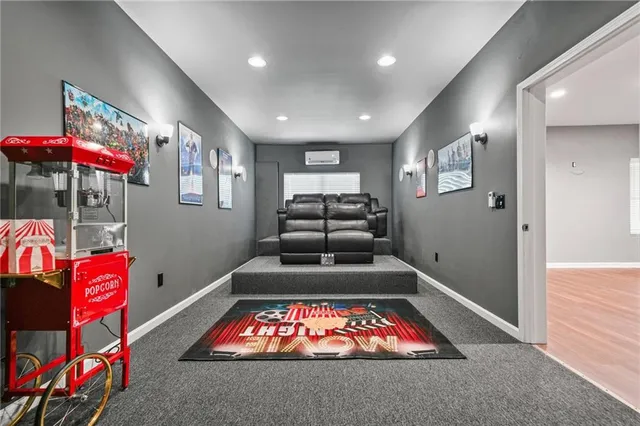 a view of a dining room with furniture and a window
