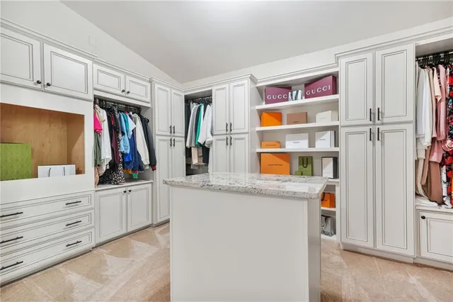 a view of a dining room and a table and chairs