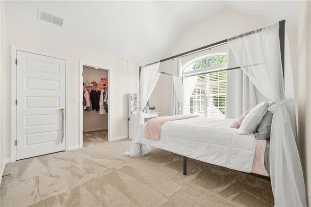 an outdoor space with furniture and umbrella