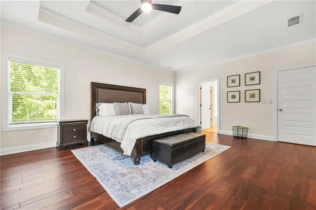 a bedroom with a bed and a cabinets