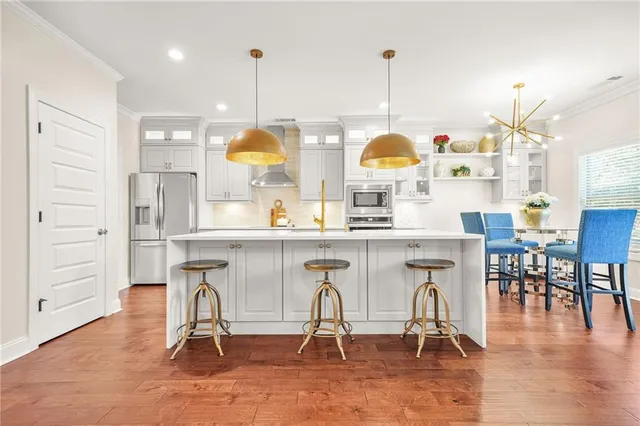 a front view of house with a garden