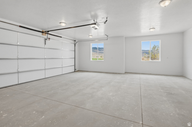 157 West 100 South Joseph, UT 84739 - Photo 26 of 30 Garage featuring a garage door opener