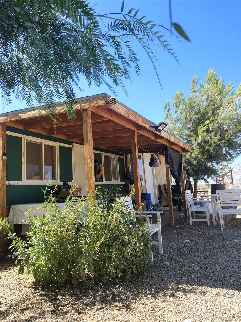 R6 137th Palmdale, CA 93591 - Photo 2 of 9 a front view of a house with garden