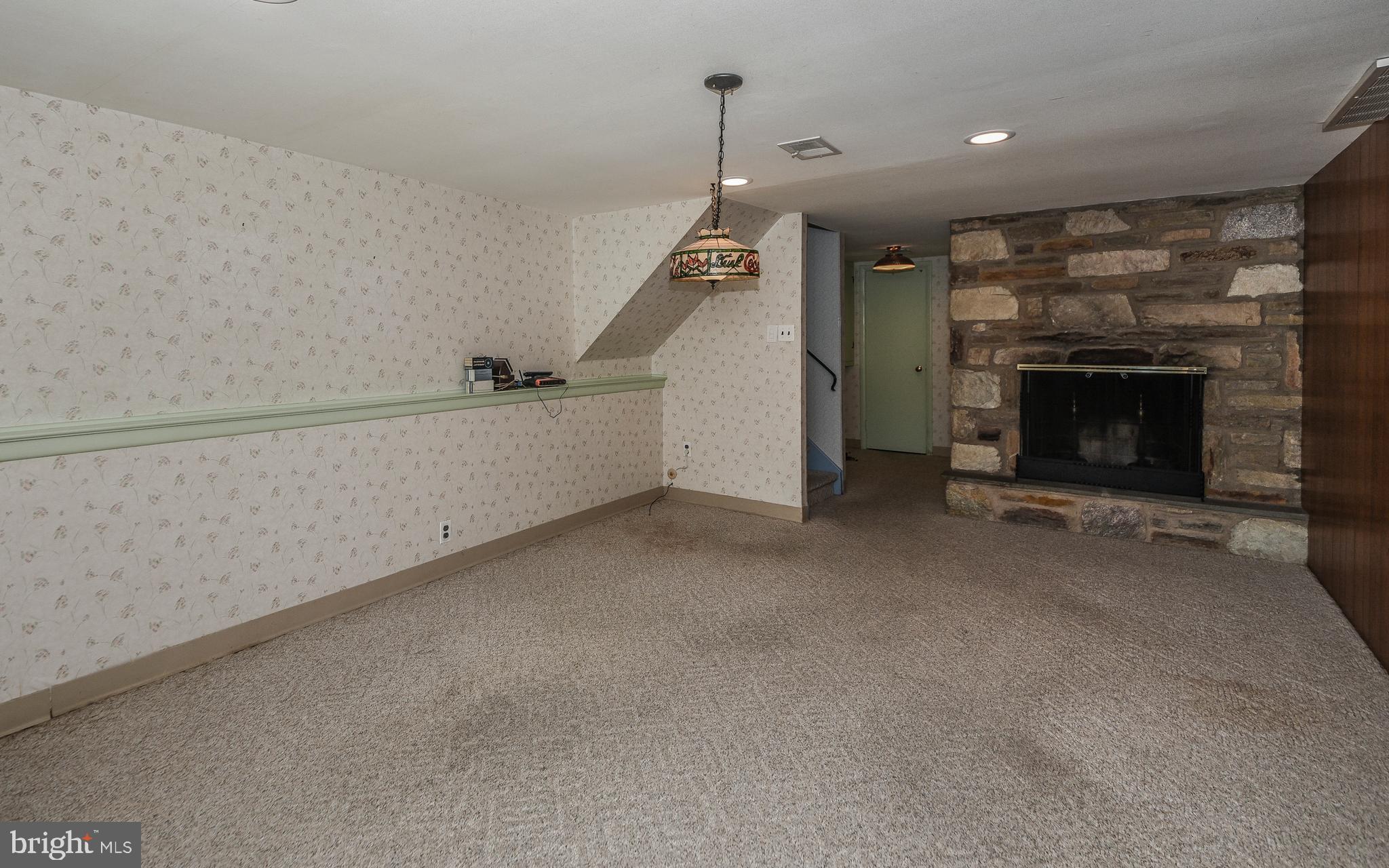305 Suffolk Road Flourtown, PA 19031 - Photo 20 of 33 Lower Level Family Room w/ Fireplace