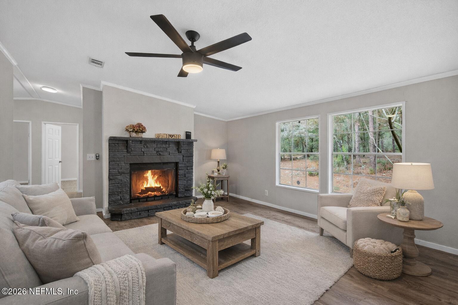 6928 Gilda Court Keystone Heights, FL 32656 - Photo 13 of 48 Virtual staged Family room