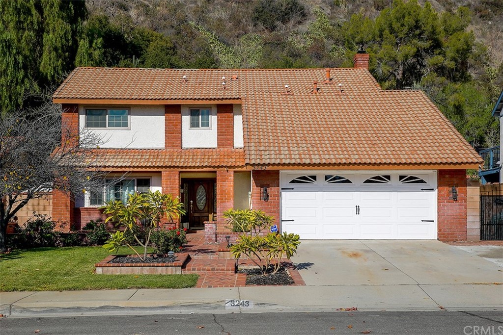 3243 Brookridge Road Duarte, CA 91010 - Photo 1 of 1 a aerial view of a house with a yard and potted plants