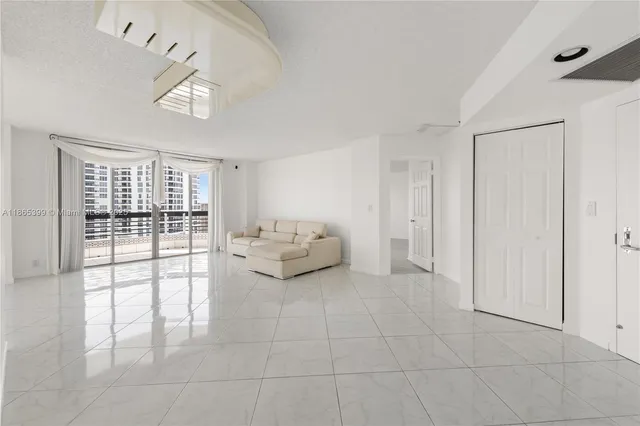 a view of a livingroom with a flat screen tv