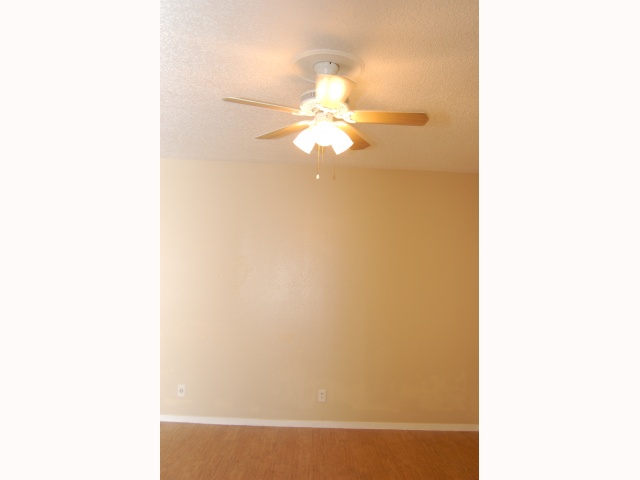 202 East 32nd Street, Unit 12 Austin, TX 78705 - Photo 4 of 6 a picture of a small space with a fan