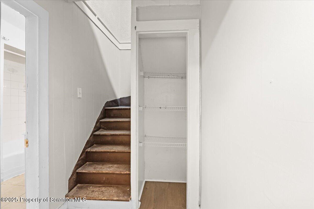 2515 North Main Avenue Scranton, PA 18508 - Photo 27 of 69 a view of staircase with white walls and white door