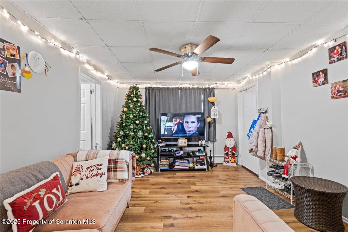 2515 North Main Avenue Scranton, PA 18508 - Photo 36 of 69 a living room with patio furniture and a chandelier