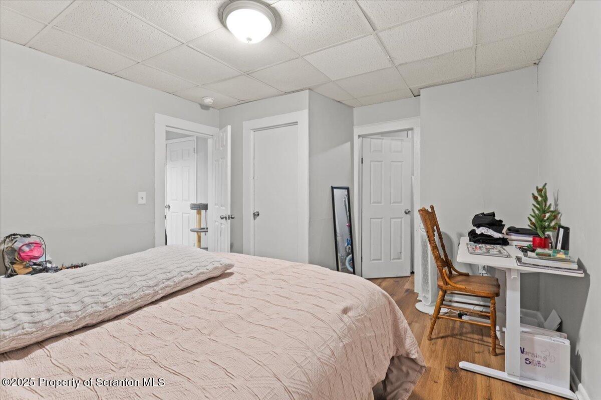 2515 North Main Avenue Scranton, PA 18508 - Photo 42 of 69 a bedroom with a bed and a table in it