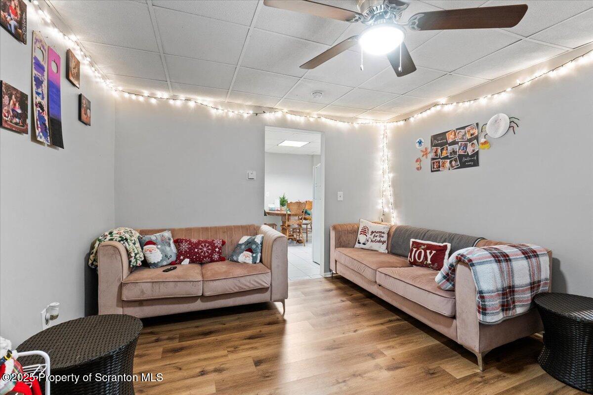 2515 North Main Avenue Scranton, PA 18508 - Photo 43 of 69 a living room with furniture and a chandelier