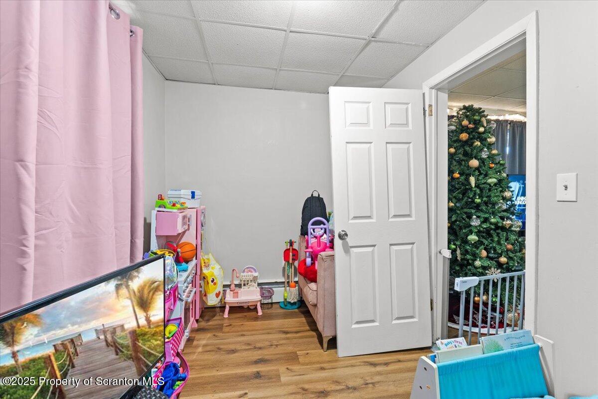 2515 North Main Avenue Scranton, PA 18508 - Photo 45 of 69 a view of a hallway with wooden floor and stairs