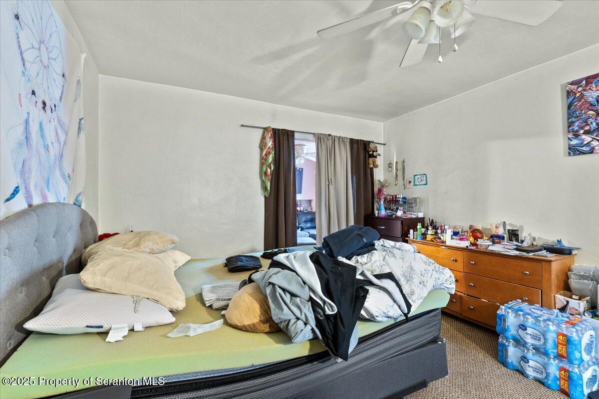 2515 North Main Avenue Scranton, PA 18508 - Photo 55 of 69 a bedroom with a bed and wooden floor